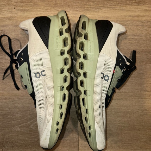 On Running Men's White and Black Sneakers with Green Accents